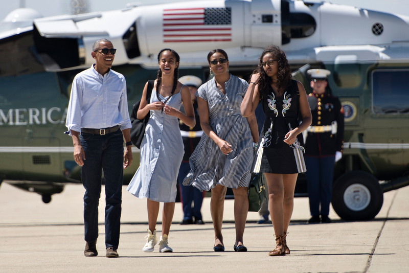 President Barack Obama, daughter Malia Obama, first lady Michelle Obama and daughter Sasha Obama walk to Air Force One at Castle Airport on June 19, 2016, in Merced County, Calif.BRENDAN SMIALOWSKI/AFP/Getty Images